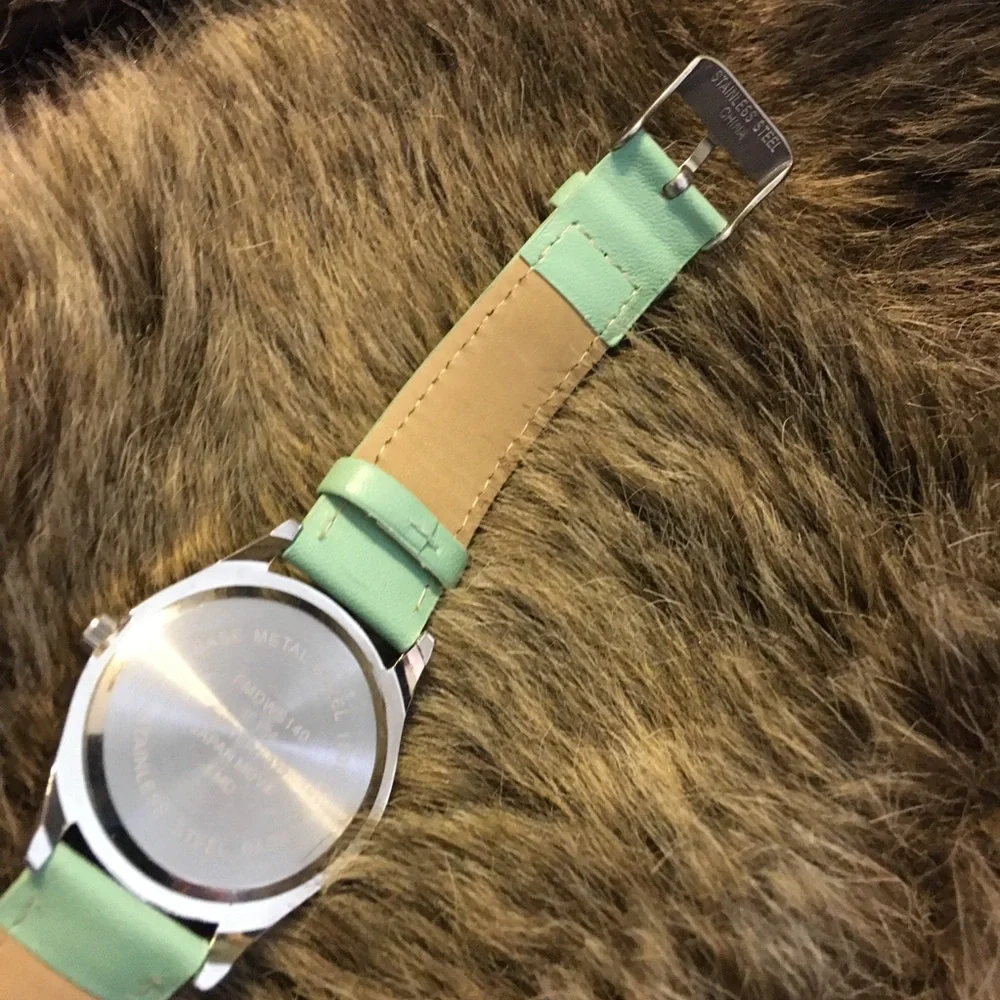 Ladies crystal quilt mint imitation leather watch